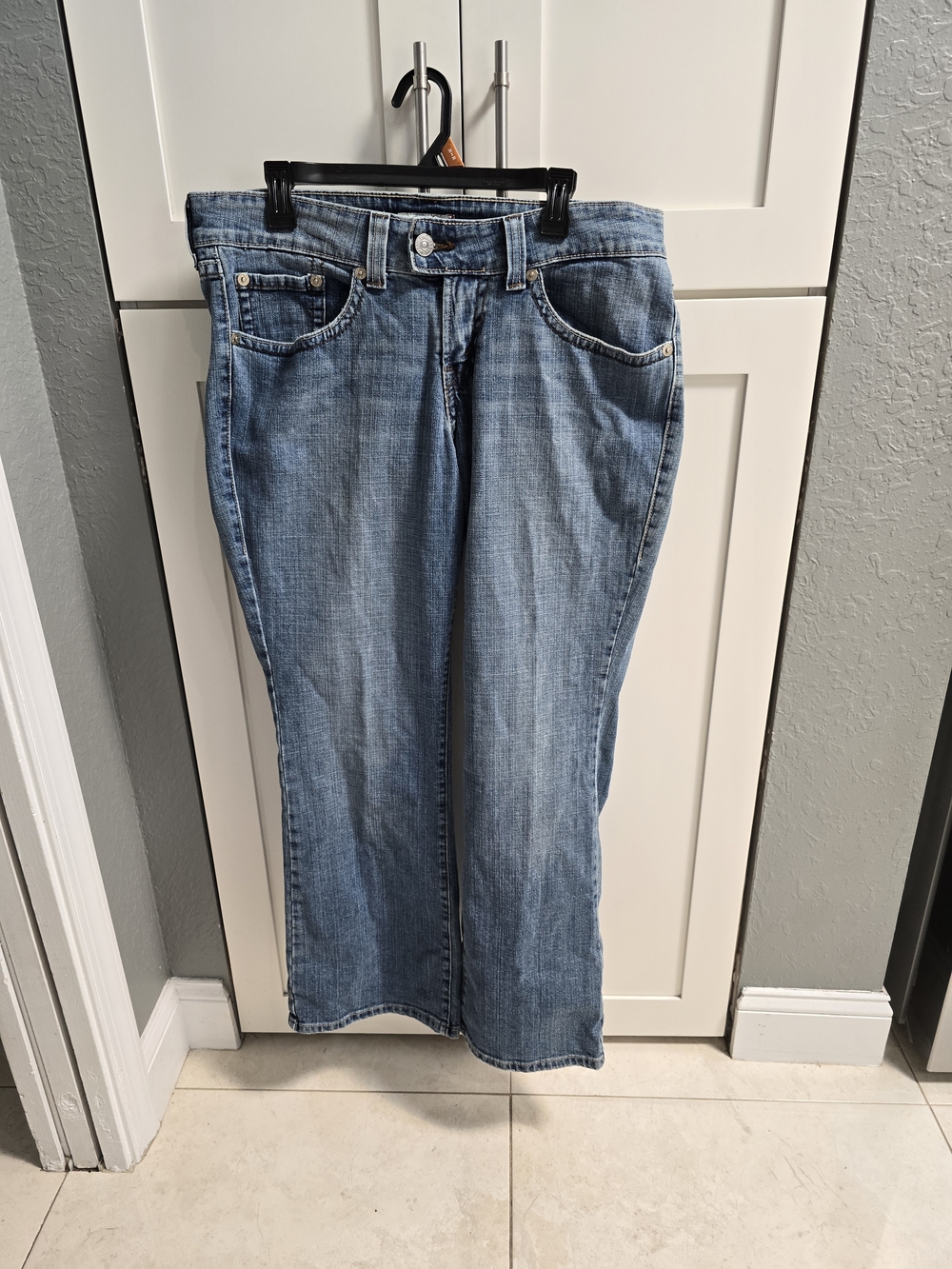 LEVIS 542 FLARE WOMENS JEANS MEDIUM WASH MADE IN EGYPT SIZE 16M